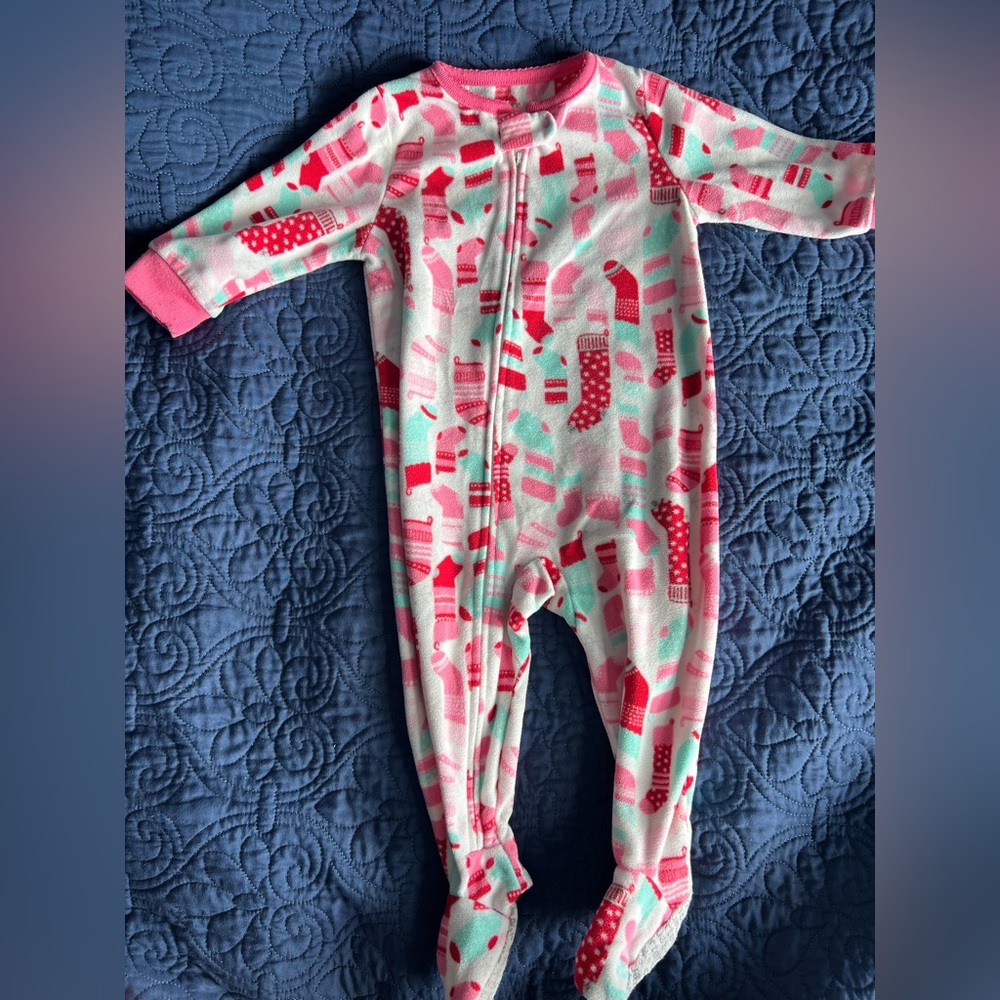 Size 12 months girls Christmas footie pajamas. Pink, red, teal stockings.